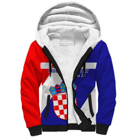 Sherpa hoodie, white-lined hood, red/blue color-block panels, zip front, crest graphic