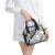 polynesia-shoulder-handbag-polynesian-tropical-flowers-black-pastel-vibes