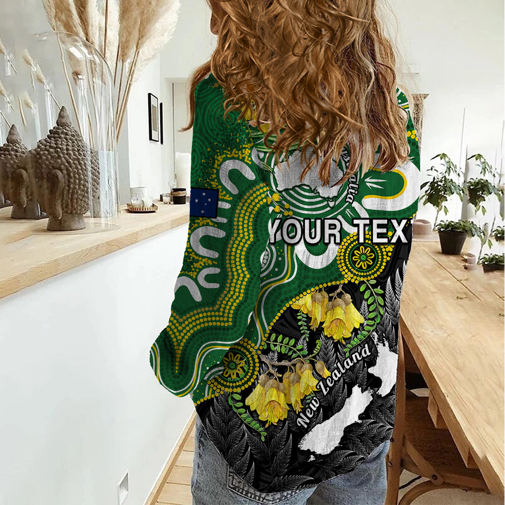 Women’s casual shirt with green and black Aboriginal-style graphic, long sleeves