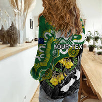 Women’s casual shirt with green and black Aboriginal-style graphic, long sleeves