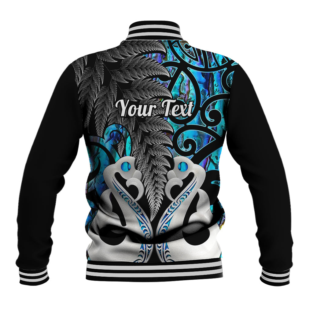 Black baseball jacket with blue tribal feather graphic and 'Your Text' on back.