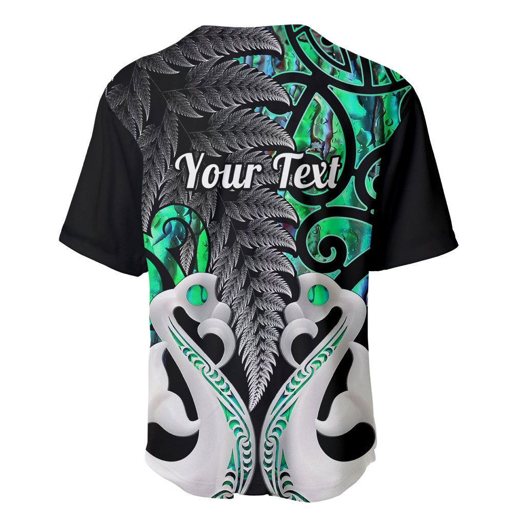 Baseball jersey back view with green accents, fern motif and “Your Text” print