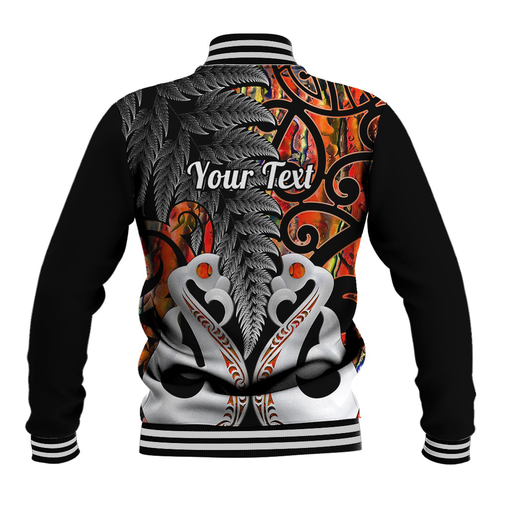 Black baseball jacket back with orange swirls, fern pattern, and 'Your Text' print