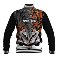 Black baseball jacket back with orange swirls, fern pattern, and 'Your Text' print