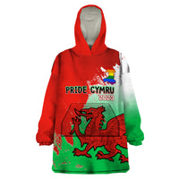 Red, green, and gray wearable blanket hoodie with hood and pride dragon graphic