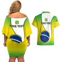 Back view of couples set: off-shoulder dress and green Hawaiian shirt with Brazil crest.