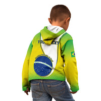 Kids green zip hoodie on child, back graphic with “YOUR TEXT” and Brazil emblem