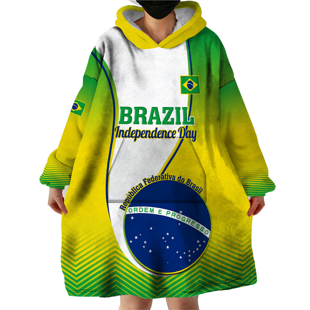 Wearable blanket hoodie on model with Brazil Independence Day front print, green and yellow hood
