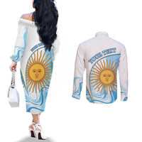 Argentina Football Personalized Couples Matching Off The Shoulder Long Sleeve Dress and Long Sleeve Button Shirt 2026 Trophy Vamos La Albiceleste - Wonder Print Shop