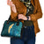 turquosie-polynesia-shoulder-handbag-plumeria-tropical-leaves-with-galaxy-polynesian-art