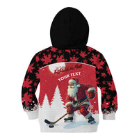 Personalized Canada Christmas Kid Hoodie Santa Claus Hockey Player - Maple Leaves Pattern - Wonder Print Shop