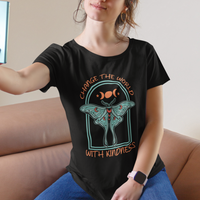 Black women’s t-shirt worn with teal luna moth graphic and “with kindness” slogan