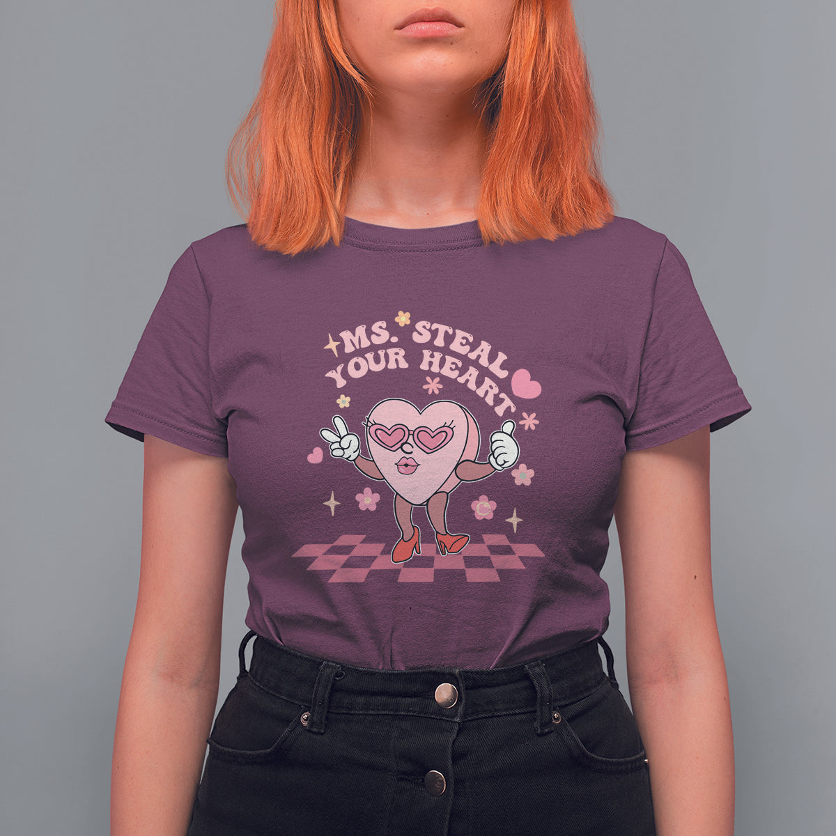 Maroon women’s graphic T-shirt with “Ms. Steal Your Heart” heart character print
