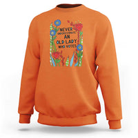 Never Underestimate an Old Lady Who Votes Sweatshirt Feminist Gift for Women - Wonder Print Shop