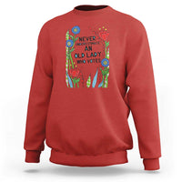 Never Underestimate an Old Lady Who Votes Sweatshirt Feminist Gift for Women - Wonder Print Shop