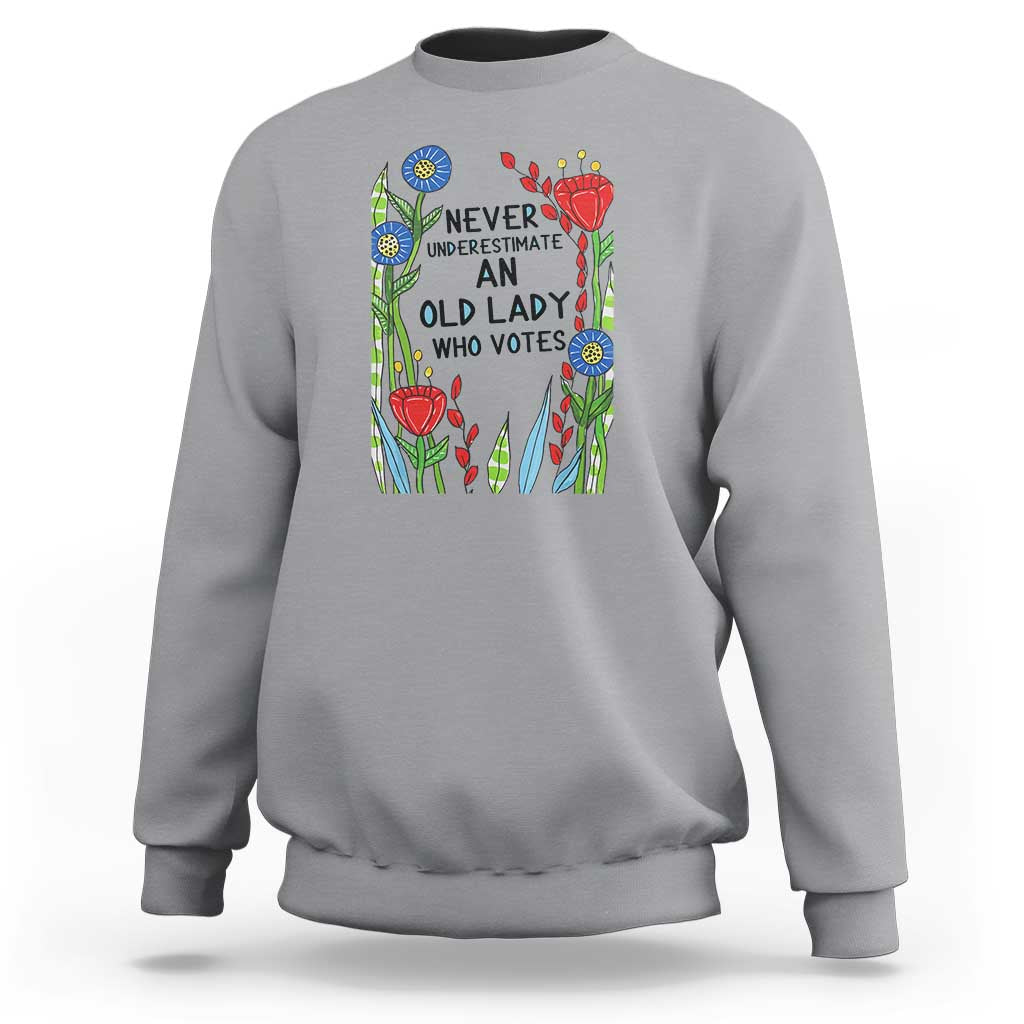 Never Underestimate an Old Lady Who Votes Sweatshirt Feminist Gift for Women - Wonder Print Shop