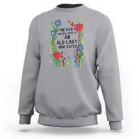 Never Underestimate an Old Lady Who Votes Sweatshirt Feminist Gift for Women - Wonder Print Shop