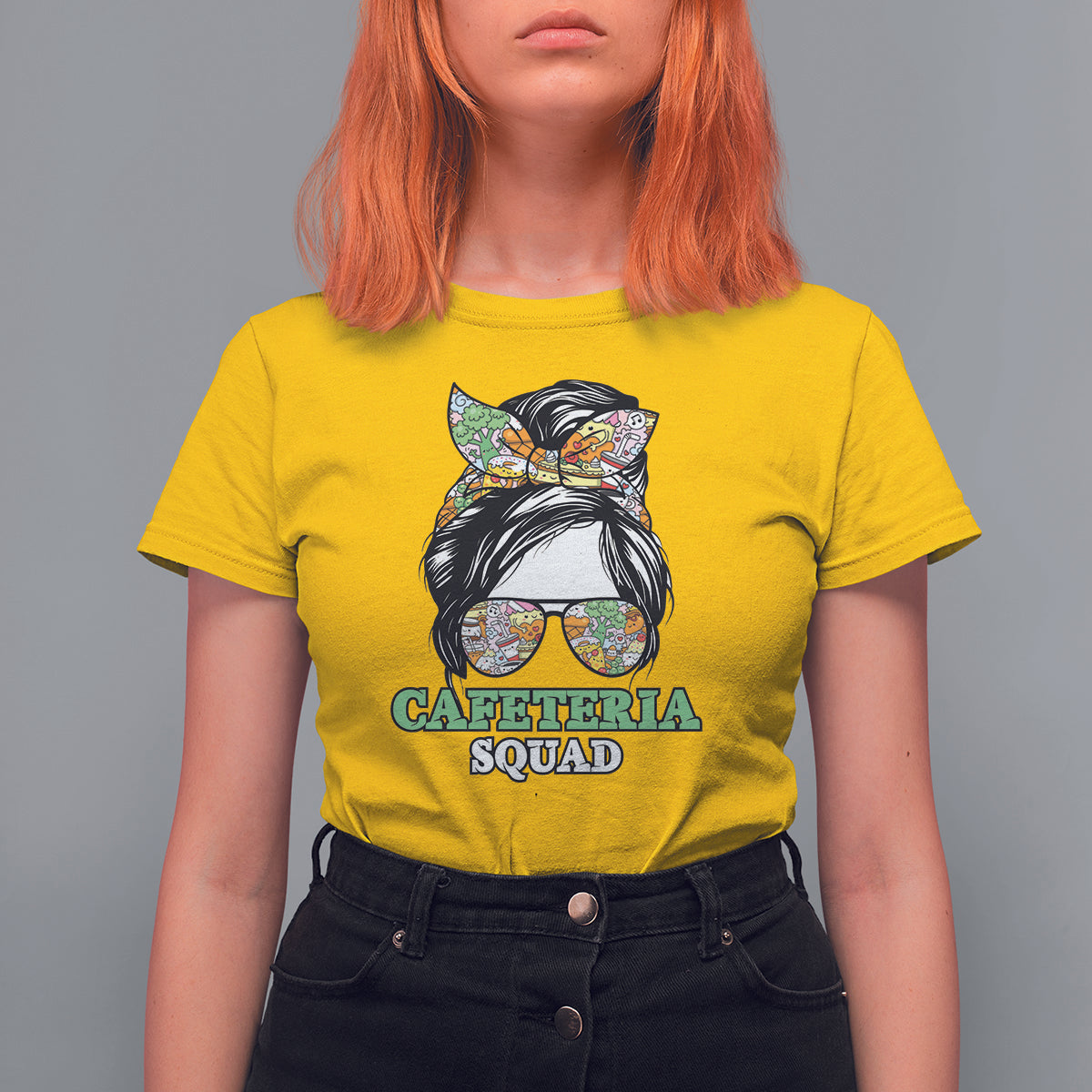 Women’s daisy yellow graphic t-shirt with “CAFETERIA SQUAD” cat print