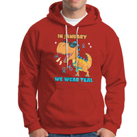 Red pullover hoodie with front graphic and “WE WEAR TEAL” text