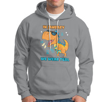 Sport gray pullover hoodie with front graphic and “WE WEAR TEAL” text
