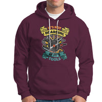 Maroon hoodie with colorful woodworker tool graphic, front kangaroo pocket, drawstring hood