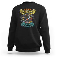 Black sweatshirt with multicolor woodworker tools graphic on the chest
