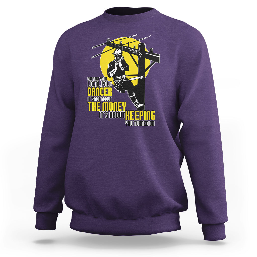 Purple crewneck sweatshirt with yellow pole dancer graphic on the front.