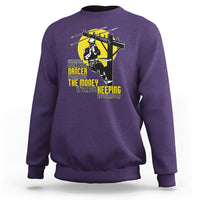 Purple crewneck sweatshirt with yellow pole dancer graphic on the front.