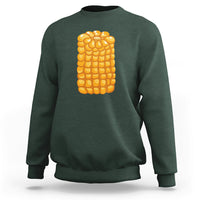Dark forest green corn-themed Halloween sweatshirt with large yellow corn graphic on back