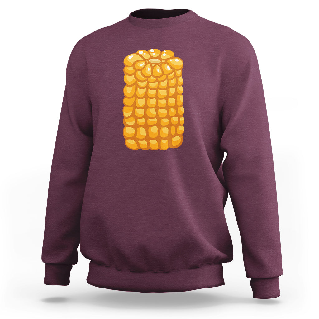Maroon corn-themed Halloween sweatshirt with large yellow corn graphic on back