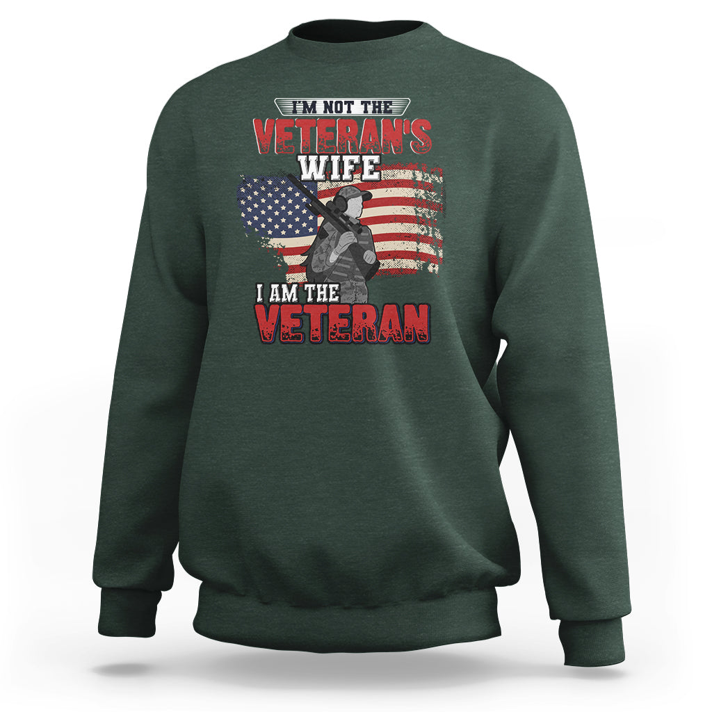 Dark forest green women's sweatshirt with Veteran graphic and American flag, crewneck long sleeves