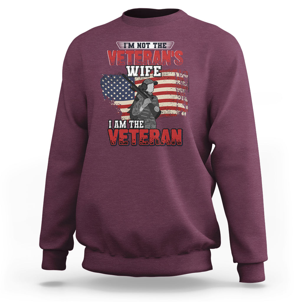 Maroon women's sweatshirt with Veteran graphic and American flag, crewneck long sleeves