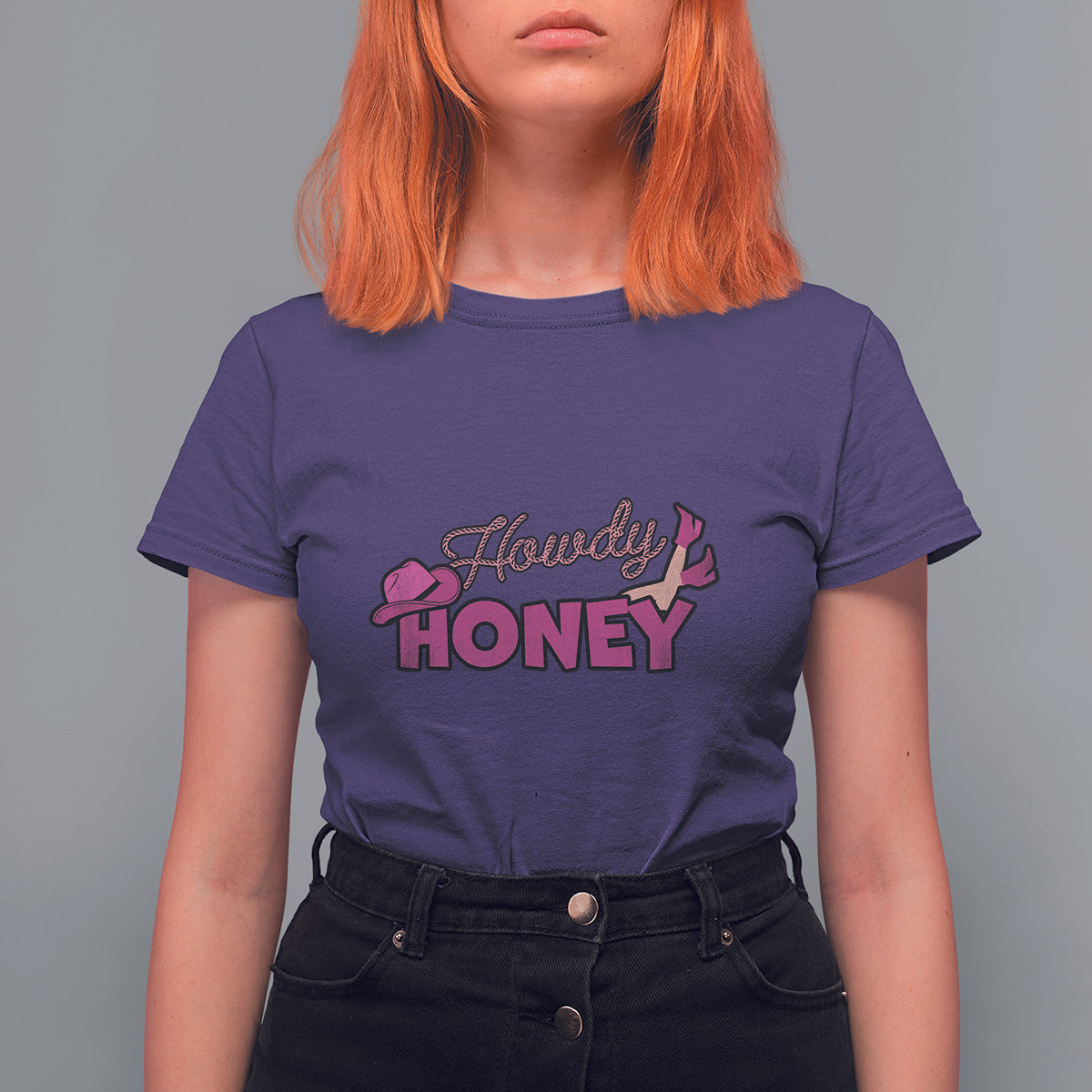 Women’s purple T-shirt with “Howdy Honey” graphic on the chest