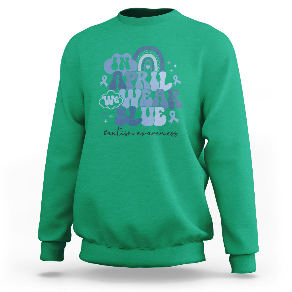 Autism Awareness Sweatshirt In April We Wear Blue Rainbow Retro Groovy - Wonder Print Shop