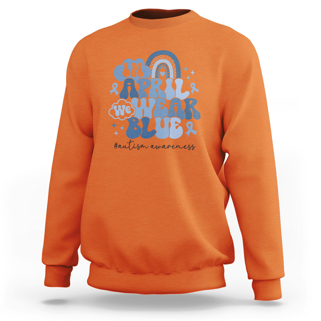 Autism Awareness Sweatshirt In April We Wear Blue Rainbow Retro Groovy - Wonder Print Shop