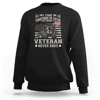 Black sweatshirt with Veteran Never Ends graphic on front
