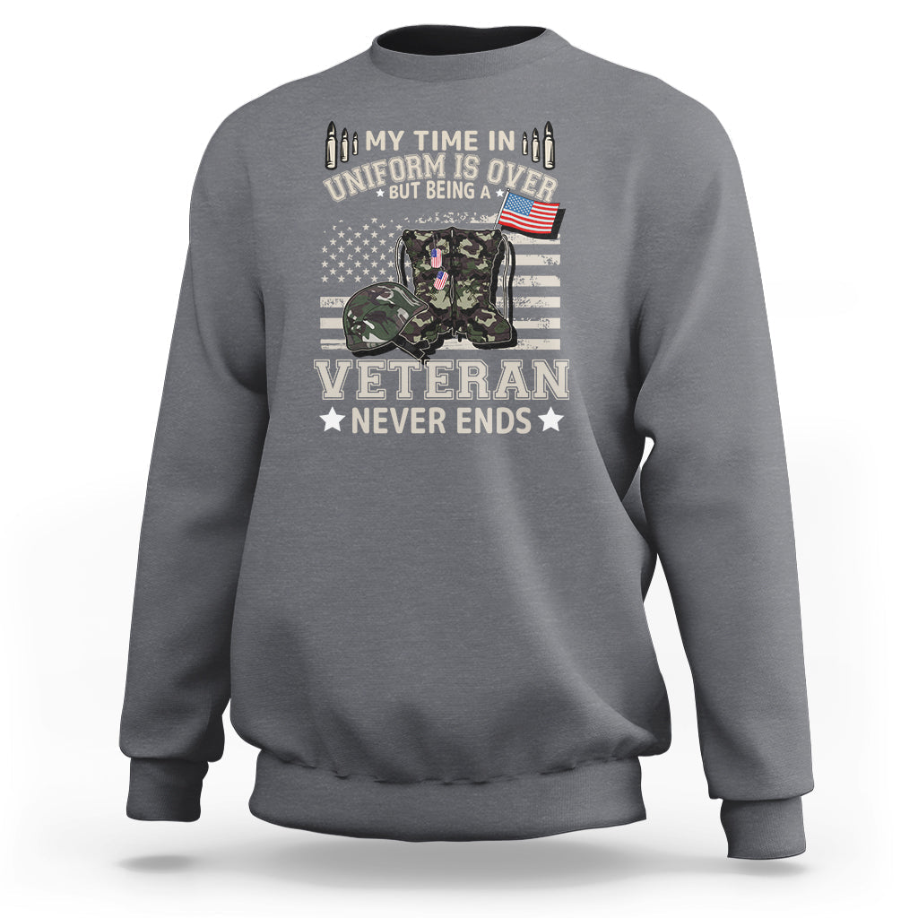 Charcoal gray sweatshirt with Veteran Never Ends graphic on front