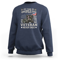 Navy blue sweatshirt with Veteran Never Ends graphic on front