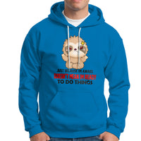 Blue hoodie with kangaroo pocket, drawstring hood, and cartoon face graphic.
