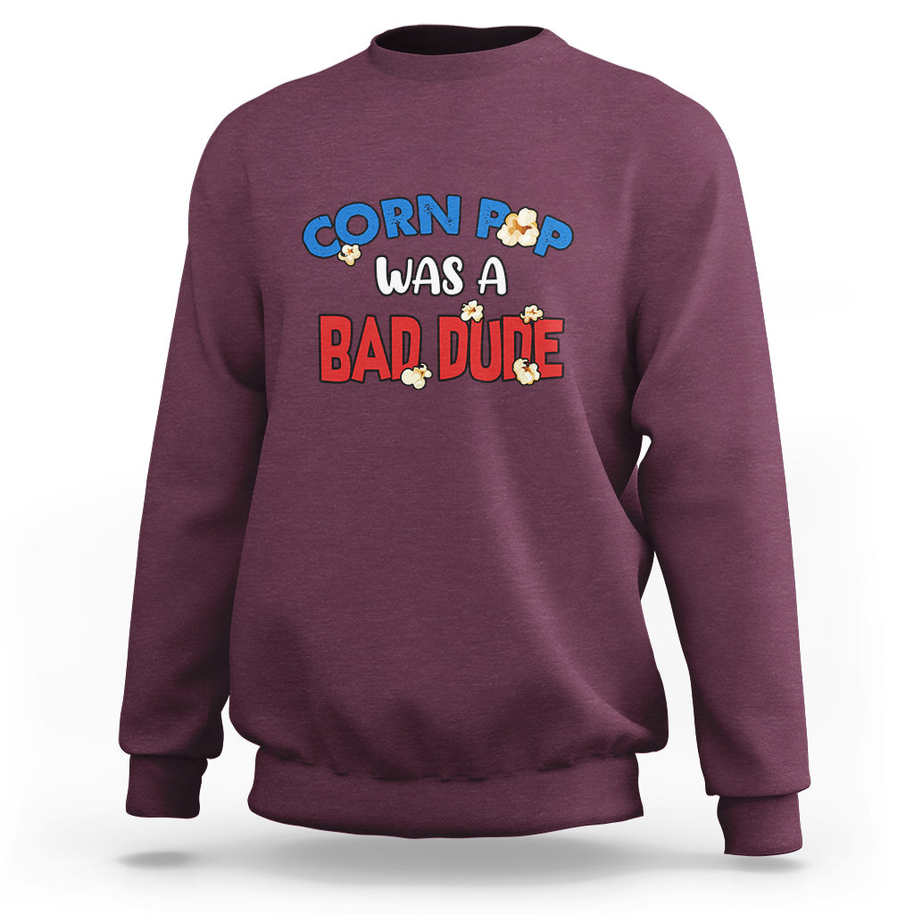 Maroon sweatshirt featuring the “Corn Pop was a bad dude” chest graphic