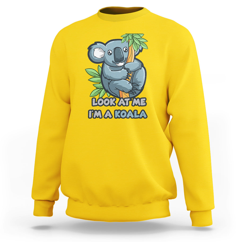 Daisy yellow koala graphic sweatshirt with “Look at me I’m a koala” front print.