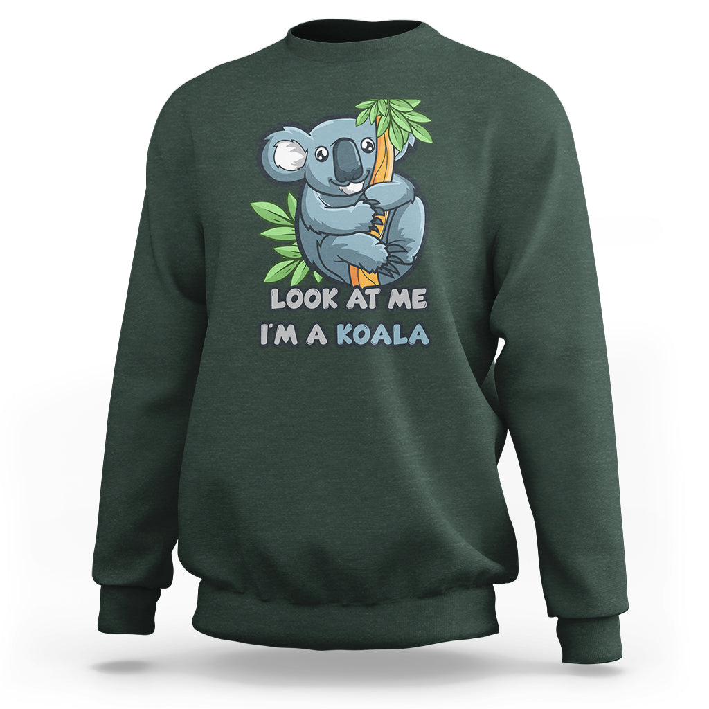 Dark forest green koala graphic sweatshirt with “Look at me I’m a koala” front print.