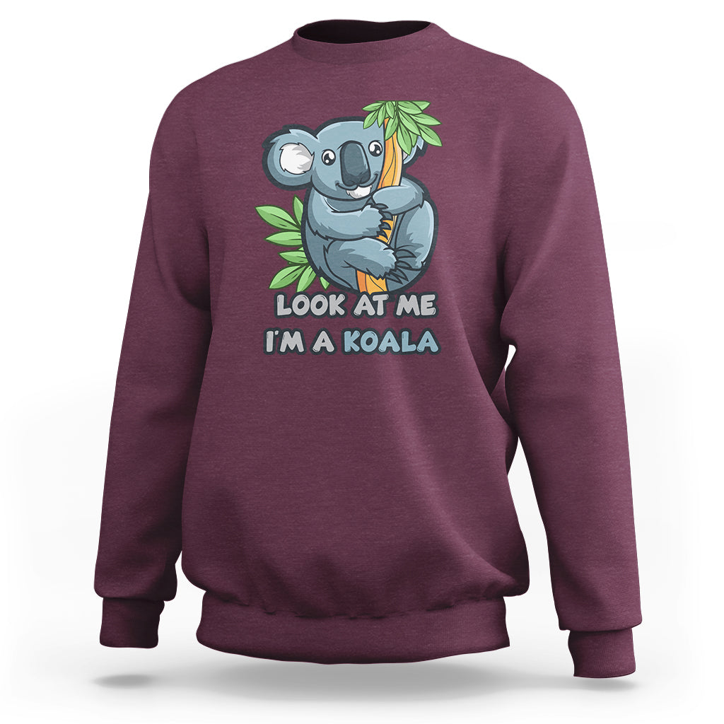 Maroon koala graphic sweatshirt with “Look at me I’m a koala” front print, crew neck.