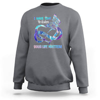 Charcoal gray sweatshirt with colorful butterfly graphic and “I have time to listen / Your life matters”.