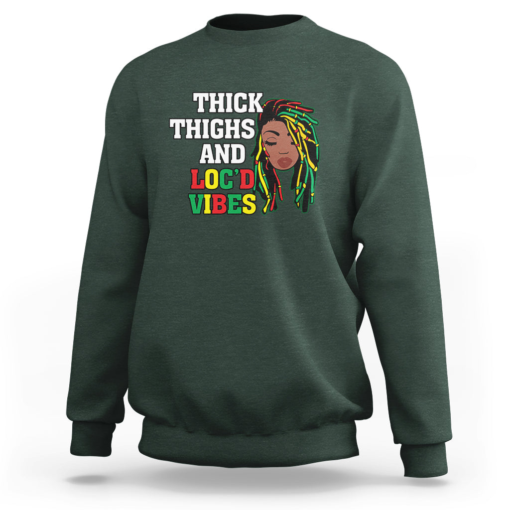Dark forest green crewneck sweatshirt with 'THICK THIGHS AND LOC'D VIBES' front graphic