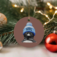 MN Strong Winter Loon with Blue Beanie Ceramic Ornament Stand with Minnesota Justice Protest