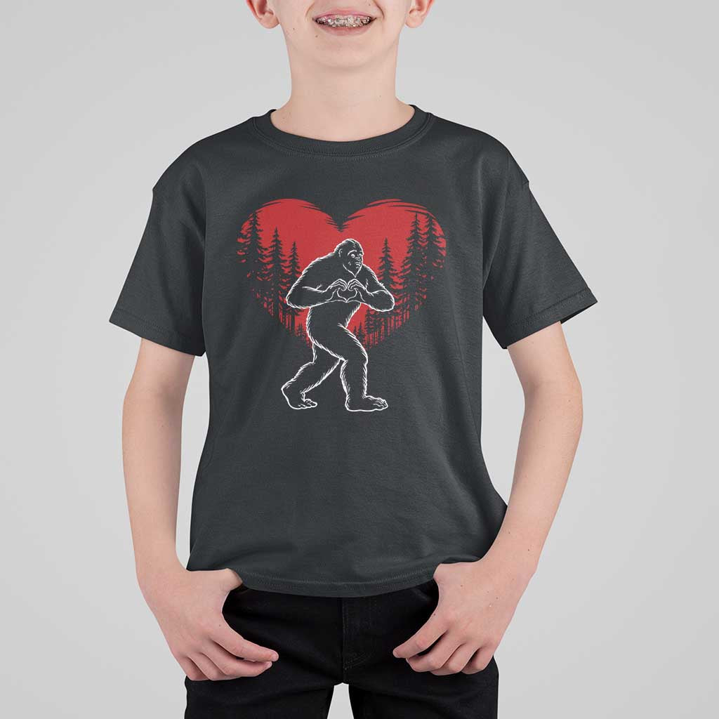 Funny Valentine Bigfoot in Love Heart Hand Sign T Shirt For Kid Romantic Sasquatch in Forest Valentines Day