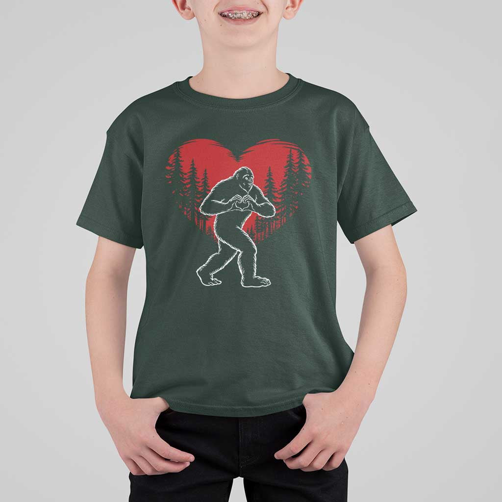 Funny Valentine Bigfoot in Love Heart Hand Sign T Shirt For Kid Romantic Sasquatch in Forest Valentines Day