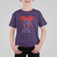 Funny Valentine Bigfoot in Love Heart Hand Sign T Shirt For Kid Romantic Sasquatch in Forest Valentines Day