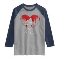 Funny Valentine Bigfoot in Love Heart Hand Sign Raglan Shirt Romantic Sasquatch in Forest Valentines Day